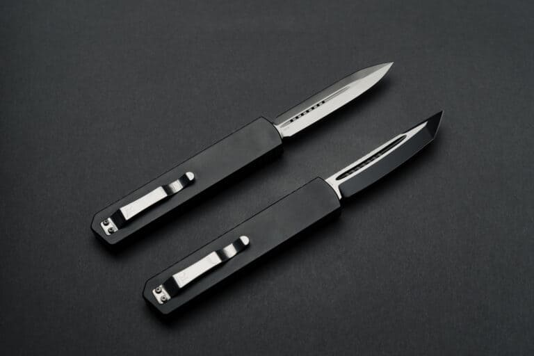 2 TACOM Nighthawk premium OTF knives blade facing right